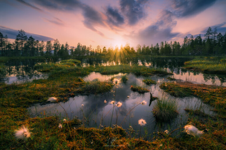 A small, picturesque nameless lake in central Norway at magical sunset