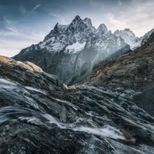 Mont Pelvoux in the Ecrins National Park in beautiful autumn light with blue sky