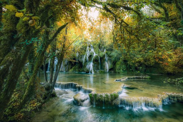 La Cascade des Tufs in the French Jura in autumn in a magical mood