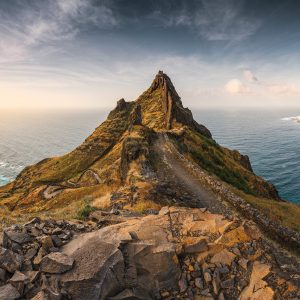 Rugged seashore on a hiking trail from Ponta do Sol to Corvo on the Cape Verde island of Santo Antao in early golden evening light