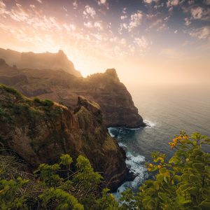 On the rugged cliffs of the north coast of Santo Antao - Cape Verde - Africa, to the colourful sunset
