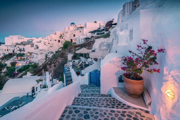 View over the white town of Oia on Santorini at dawn