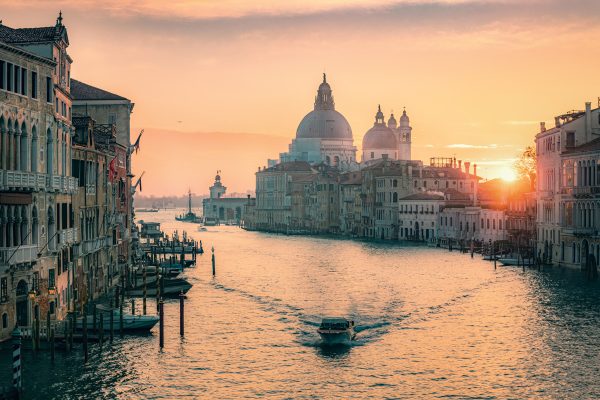 View over the Grand Canal to the Basilica Santa Maria della Salute in the colourful sunrise