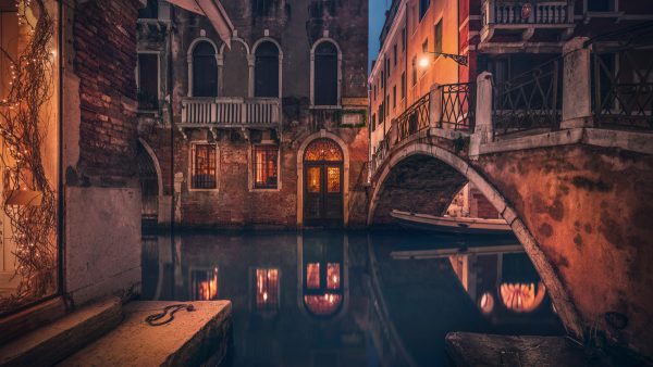 Romantic canal in Venice in atmospheric evening light