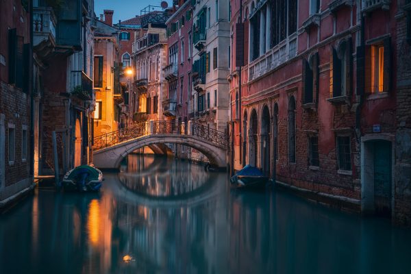 Romantic canal in Venice in atmospheric evening light